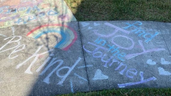 Lake Nona neighborhood does "Chalk your Walk" challenge, spreading positive drawings & messages
