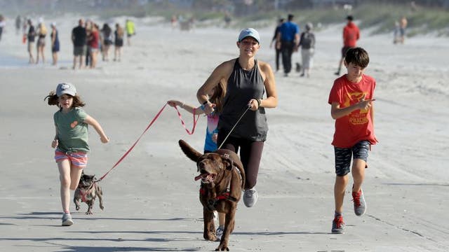 Florida county reopens beaches, but with restrictions