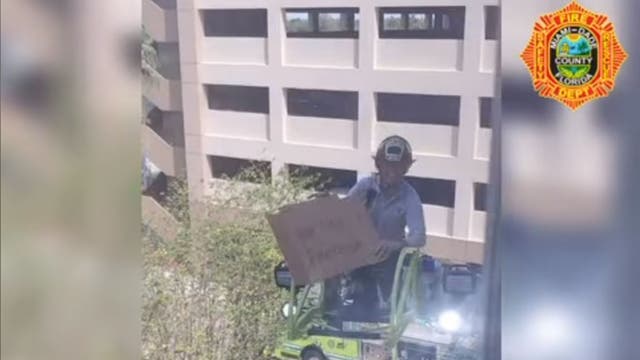 Florida firefighter hospitalized with coronavirus gets surprise at window from colleagues, says 'this is love'