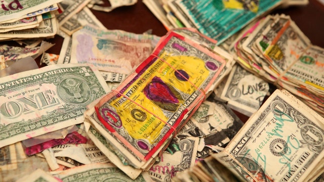 Florida pub removes $10K stapled to walls for unemployed staff