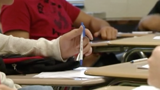 Deal gives teachers full pay, adjusted hours