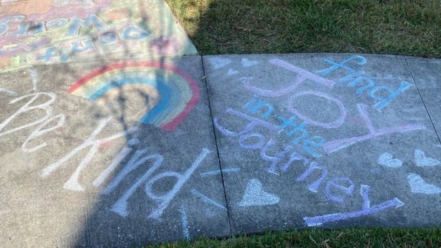 Lake Nona neighborhood does "Chalk your Walk" challenge, spreading positive drawings & messages