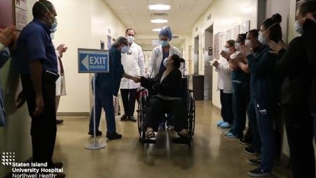 Hospital staff cheers as mom leaves hospital after beating COVID-19