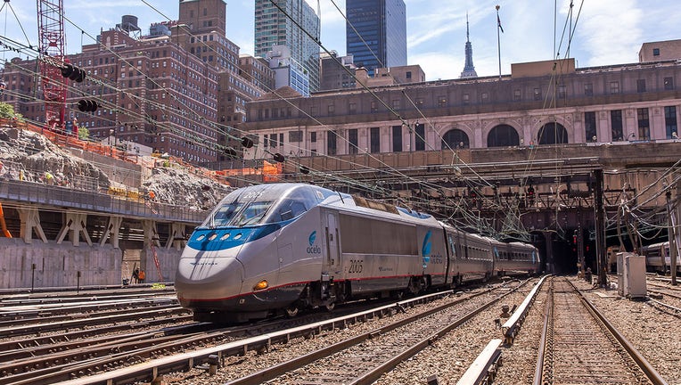 Amtrak train emerging from a Penn Station tunnel