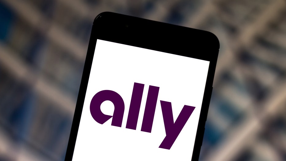 In this photo illustration a Ally Bank logo is displayed on