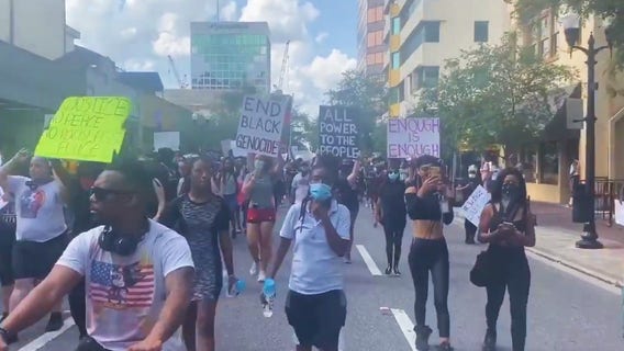 Rowdy crowds met with pepper spray during march to protest deadly arrest of George Floyd