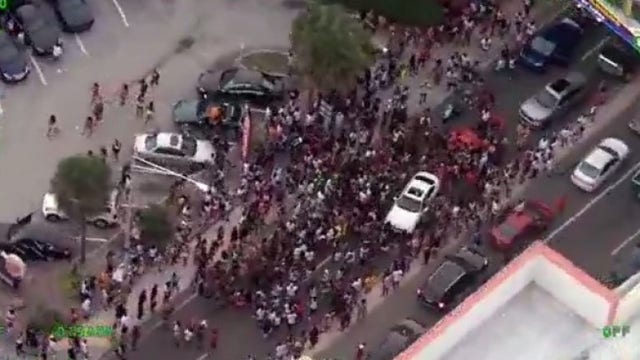 Officials step up security after massive crowds flock to Daytona Beach for Memorial Day weekend