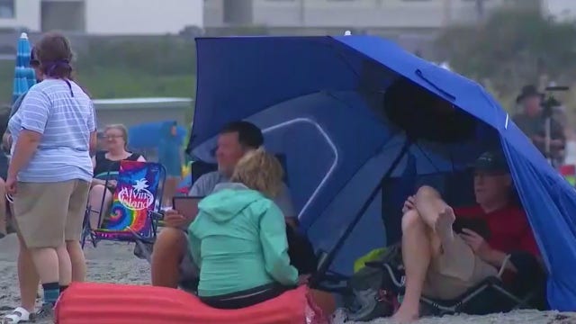 Visitors stick around Brevard County for historic launch, now scheduled for Saturday