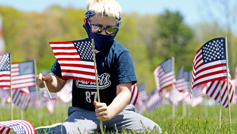 New England Patriots And Revolution Plant American Flags To Honor Veterans For Memorial Day