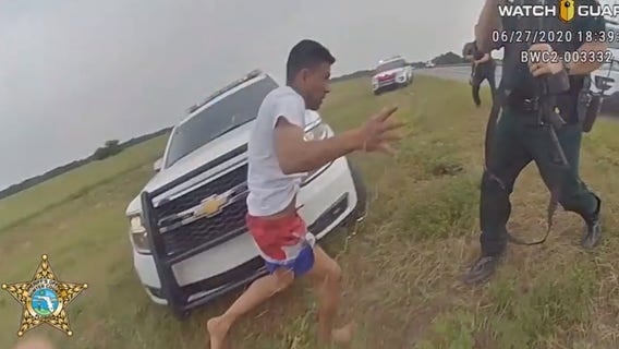 Suspect caught on body camera rushing at deputies