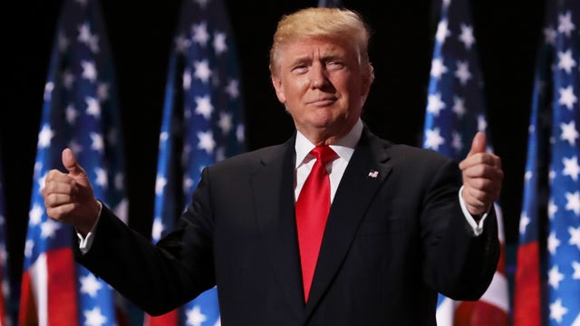 Trump says 'I'm all for masks' but hopes coronavirus will 'just disappear'
