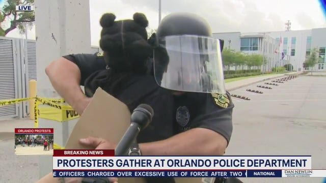 Orlando police officer, protester have heart-to-heart moment