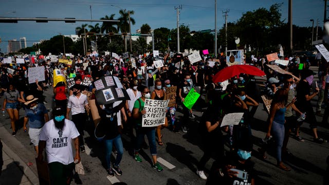 Kissimmee Police Department march alongside protesters, denouncing police brutality