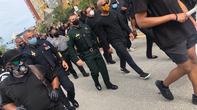 Live updates: Orange County Sheriff walks in solidarity with George Floyd supporters