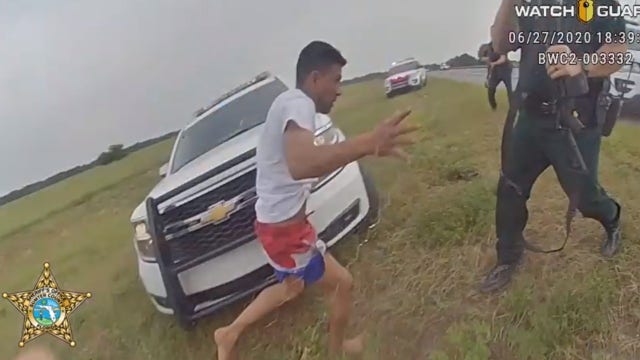 Suspect caught on body camera rushing at deputies