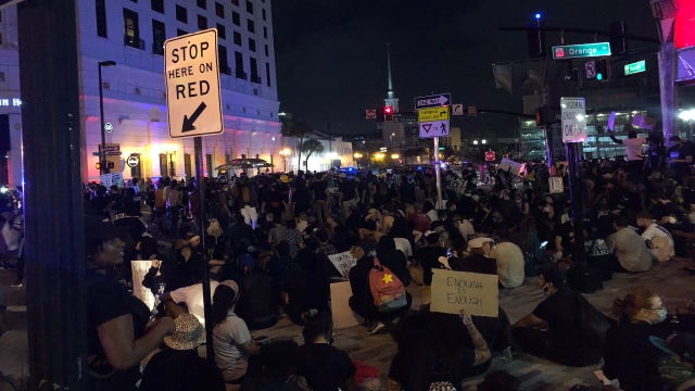 Protesters outside Orlando City Hall dispersed in tense exchange with police