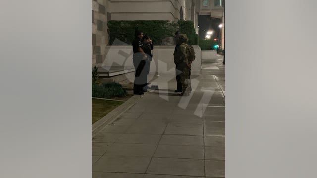 Man arrested for allegedly impersonating National Guard soldier; found with cache of weapons