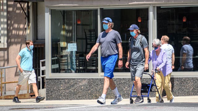 Taller people face higher risk of catching COVID-19, survey says