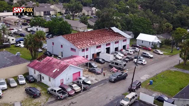 ‘Before I knew it, the storm was here': DeLand car shop hides for safety as tornado blows off roof of building