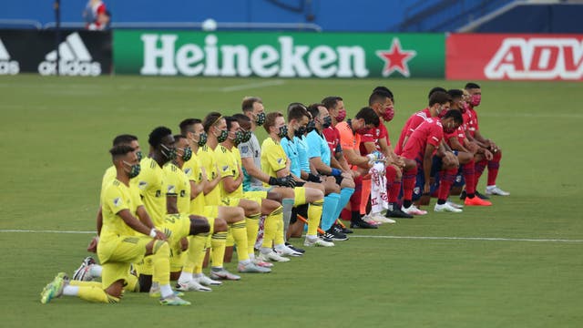 Players kneeling for anthem met with boos before MLS game