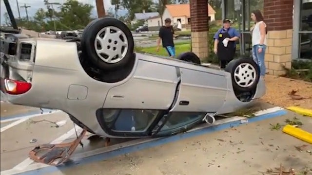 VIDEO: Cars flipped over, trees on roofs after possible tornado tears through DeLand