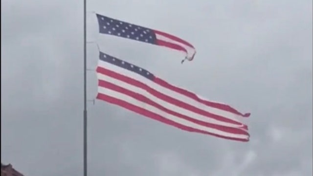 Giant U.S. flag torn apart by Hurricane Laura in Louisiana