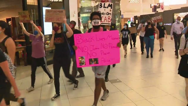 Protesters march inside Florida Mall, justice demanded for Salaythis Melvin, more body cam video released