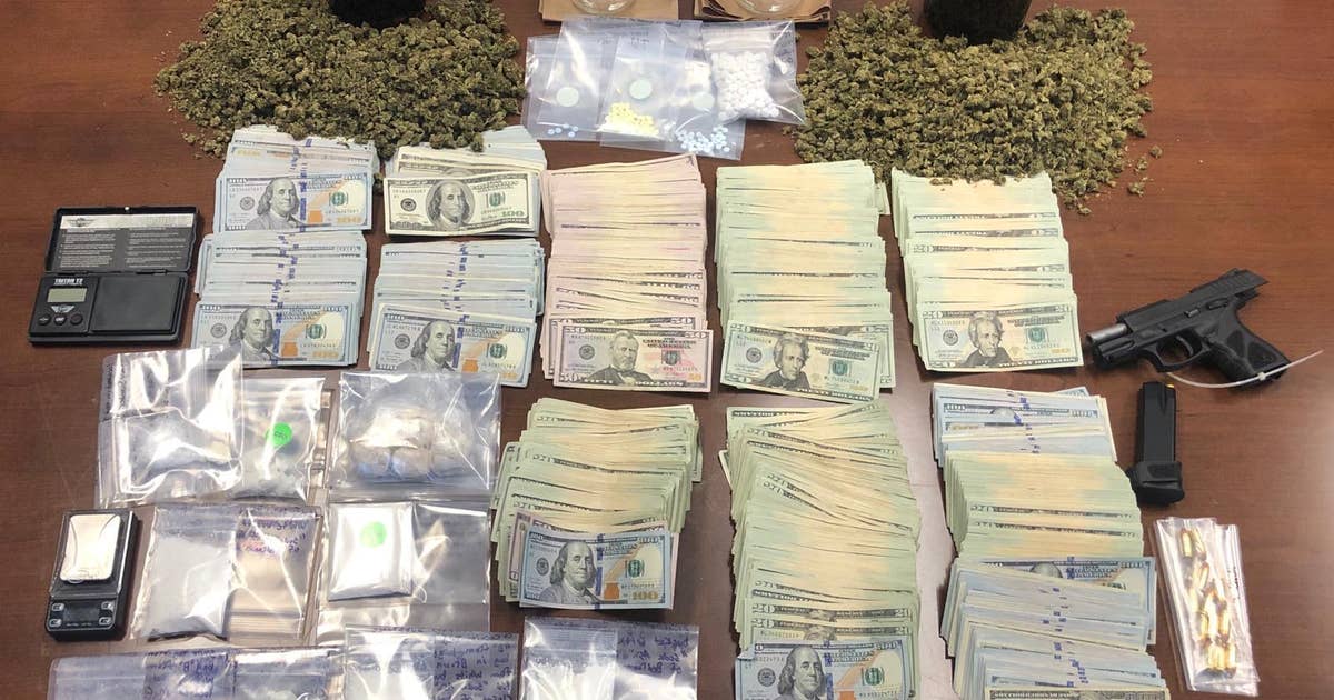 Deputies: Drugs, gun, over $100K in cash found inside Lake County home ...