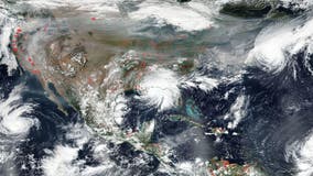Hurricanes and fires across US revealed in NASA satellite image