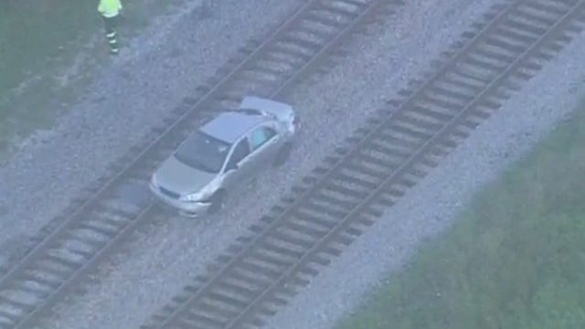 1 injured after vehicle gets stuck on tracks, hit by SunRail train