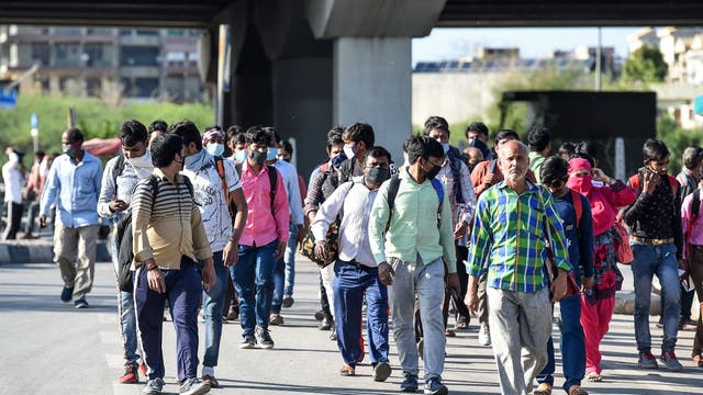 India moves into 2nd place behind US in COVID-19 cases amid economic pain