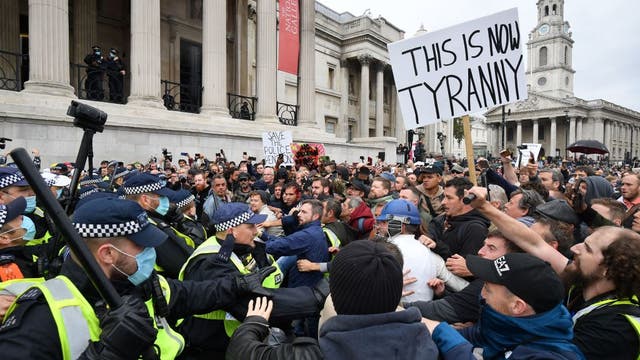 Police clash with thousands as demonstrators protest against COVID-19 restrictions in UK