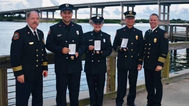 Central Florida firefighters recognized for saving woman's life during fire at her residence