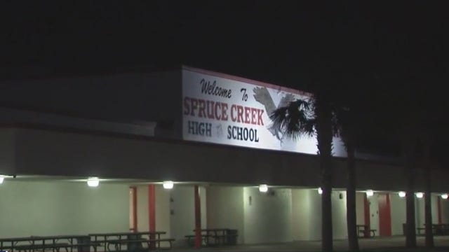 Photo from high school in Volusia County shows large group of students in hallway