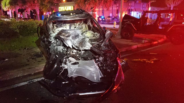 Police: Teen saves woman from fiery crash; woman facing charges