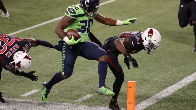 Wilson throws 2 TDs, Seahawks hold off Cardinals 28-21
