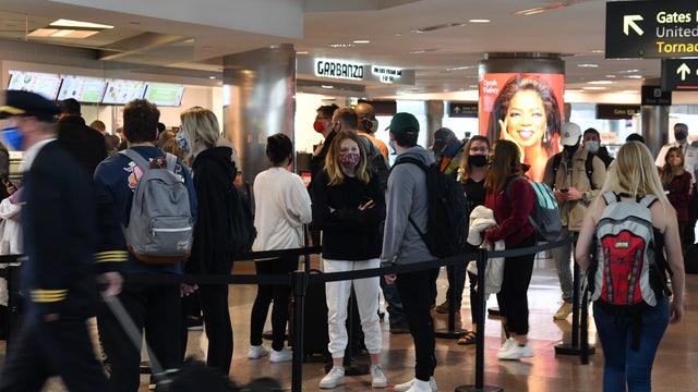 Large crowds still reported at airports across the nation, although overall number of travelers is down