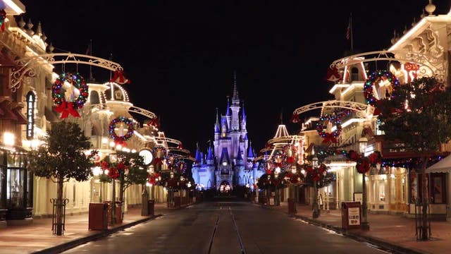 Disney's Magic Kingdom transforms for the holidays