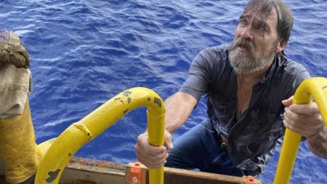 Coast Guard helped rescue man clinging to boat off Florida's coast
