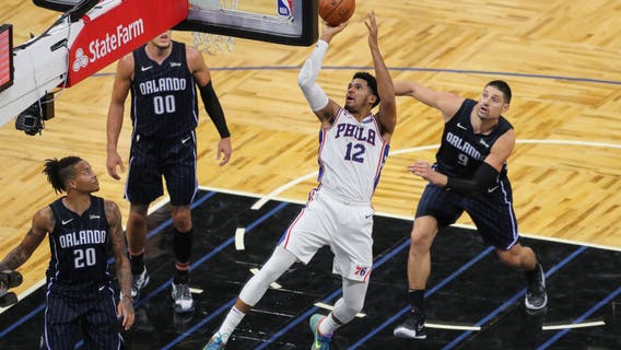 Torrid shooting helps 76ers rout previously unbeaten Magic