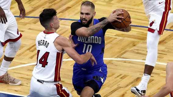 Fournier has late surge, helps Magic beat Heat 113-107