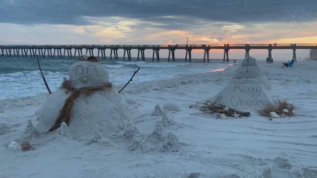 Floridians swap snow for sand with wintry beach creations