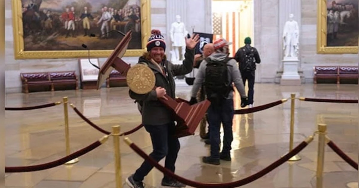 Florida man identified in Capitol riot viral photo carrying US House ...