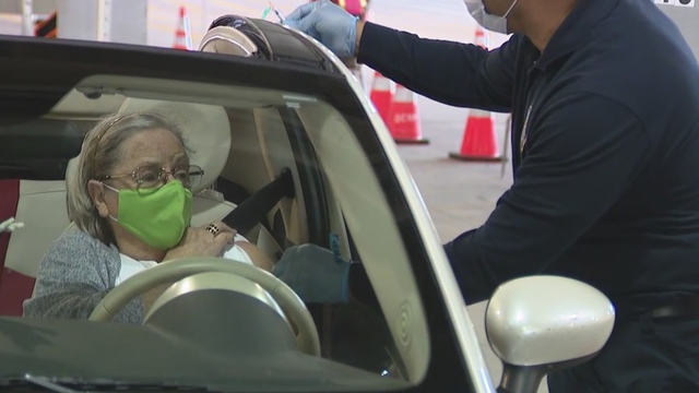 Disney World reps tour Orange County Convention Center vaccination site