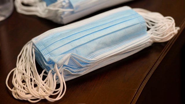 Face masks mysteriously appearing on doorsteps part of ‘brushing’ scam, Better Business Bureau says
