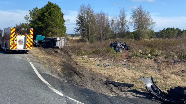 FHP: 2 killed after car collides with dump truck in Lake County