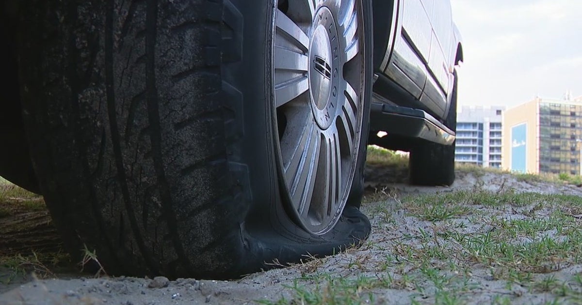 Man accused of slashing tires on dozens of vehicles in hotel parking ...