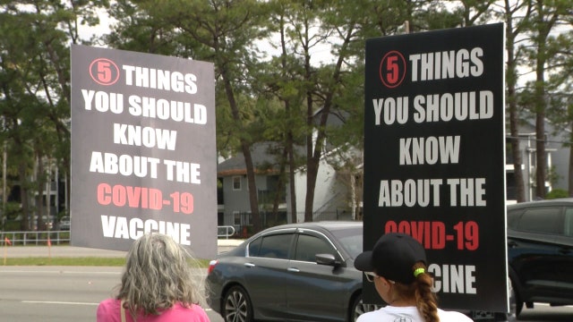 Group protests outside of federal mass vaccination site