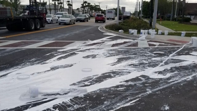 What a mess! 150 gallons of paint spill onto Orlando roadway