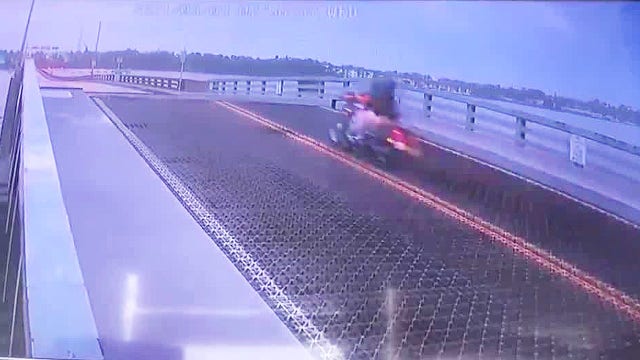 Video appears to show biker jumping over rising drawbridge in Daytona Beach